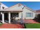Exterior showcasing a covered patio, sliding glass door, and easy access to outdoor entertaining at 6705 Old Newbury Ave, Las Vegas, NV 89108
