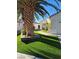 Charming single-story home featuring terracotta roof and inviting desert landscaping with artificial turf at 6705 Old Newbury Ave, Las Vegas, NV 89108