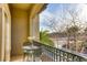 Cozy balcony featuring an outdoor dining set and a view of the neighborhood at 7210 El Malpais St, Las Vegas, NV 89118
