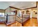Open hallway with hardwood floors, detailed millwork, and decorative accents, offering a bright atmosphere at 7210 El Malpais St, Las Vegas, NV 89118