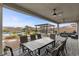 Inviting outdoor living space with covered patio, dining area, built-in barbecue, and a pool at 7277 W Landberg Ave, Las Vegas, NV 89178