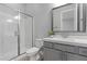 Modern bathroom showcasing a glass-enclosed shower, sleek vanity, and contemporary fixtures for a spa-like experience at 7277 W Landberg Ave, Las Vegas, NV 89178