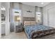 Cozy bedroom featuring a bed with stylish linens and nightstands, complemented by ample natural light at 7277 W Landberg Ave, Las Vegas, NV 89178