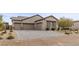 Charming home with a spacious driveway and a well-manicured yard at 7277 W Landberg Ave, Las Vegas, NV 89178