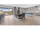 Open-concept kitchen and dining area with a view of the backyard, creating a seamless living space at 7277 W Landberg Ave, Las Vegas, NV 89178