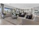 Open concept living room featuring a neutral color palette and plenty of natural light at 7277 W Landberg Ave, Las Vegas, NV 89178