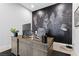 Home office featuring a world map accent wall, a large wooden desk and modern decor at 7277 W Landberg Ave, Las Vegas, NV 89178