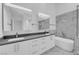 Contemporary bathroom with double sink vanity, modern bathtub, and tiled shower at 7368 Mission Hills Dr, Las Vegas, NV 89113