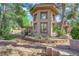 Architectural detail abounds around this corner lot home in a serene setting at 7368 Mission Hills Dr, Las Vegas, NV 89113