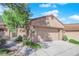 Attached two-car garage offers convenience and curb appeal at 7368 Mission Hills Dr, Las Vegas, NV 89113
