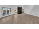 Spacious living room features natural light, wood floors, and a marble fireplace at 7368 Mission Hills Dr, Las Vegas, NV 89113