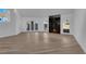Bright living room with fireplace and ample natural light at 7368 Mission Hills Dr, Las Vegas, NV 89113