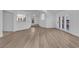 Open-concept living room features wood floors and great natural light at 7368 Mission Hills Dr, Las Vegas, NV 89113