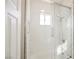 Modern bathroom with a glass-enclosed shower, sleek fixtures, and stylish tile work at 7464 Forestdale Ct, Las Vegas, NV 89120