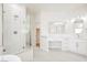 Well-lit bathroom featuring a glass shower, modern vanity, and stylish fixtures at 7464 Forestdale Ct, Las Vegas, NV 89120