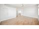 A spacious bedroom offering hardwood floors, neutral walls, and natural lighting at 7464 Forestdale Ct, Las Vegas, NV 89120