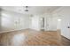 Large primary bedroom with hardwood floors and bright natural lighting at 7464 Forestdale Ct, Las Vegas, NV 89120