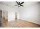 Spacious bedroom with a ceiling fan and ample closet space at 7464 Forestdale Ct, Las Vegas, NV 89120