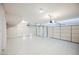 This oversized garage features a sleek epoxy floor and new garage doors at 7464 Forestdale Ct, Las Vegas, NV 89120