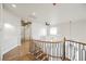 Open loft area showcasing modern railings and natural light at 7464 Forestdale Ct, Las Vegas, NV 89120