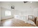 Bright loft with hardwood floors, fan, and recessed lights at 7464 Forestdale Ct, Las Vegas, NV 89120