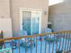 Relaxing balcony with comfortable seating, perfect for enjoying outdoor leisure at 7665 Calico Fields St, Las Vegas, NV 89149