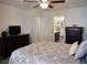 Bright bedroom with ceiling fan and ensuite bathroom access for added convenience at 7665 Calico Fields St, Las Vegas, NV 89149