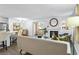 Bright living room featuring a fireplace, modern decor, and sliding glass doors at 7904 Fossil Creek Ln # 101, Las Vegas, NV 89145