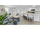 Comfortable living room with a modern sofa, stylish decor, and a view into the kitchen at 7904 Fossil Creek Ln # 101, Las Vegas, NV 89145