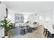 Inviting living room with contemporary decor, a comfortable sofa, and stylish accents at 7904 Fossil Creek Ln # 101, Las Vegas, NV 89145