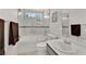 Bathroom featuring a shower-tub combo, a toilet and single sink at 8468 W Gilmore Ave, Las Vegas, NV 89129
