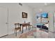 Bright dining area with sliding door access to the inviting pool area at 8468 W Gilmore Ave, Las Vegas, NV 89129