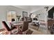Bright living room featuring comfortable seating, modern decor, and lots of natural light at 8468 W Gilmore Ave, Las Vegas, NV 89129