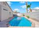 Backyard swimming pool offers a refreshing escape with ample space for relaxation and fun at 8468 W Gilmore Ave, Las Vegas, NV 89129