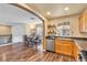 Kitchen with dining table and hardwood floors at 8932 Jaquita Ave, Las Vegas, NV 89149