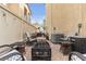 Private patio area with fire pit and lounge seating, perfect for outdoor entertaining at 8932 Jaquita Ave, Las Vegas, NV 89149