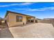 Low-maintenance backyard with a covered patio and block wall fencing at 10186 Zeta Tucana St, Las Vegas, NV 89143