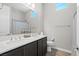 Bright bathroom with dual sinks, sleek fixtures, and modern finishes for a luxurious experience at 10186 Zeta Tucana St, Las Vegas, NV 89143