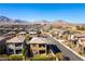 A beautiful residential neighborhood with stunning mountain views on a clear, sunny day at 12381 Liberty Beacon Ave, Las Vegas, NV 89138