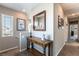 Upstairs hallway with wood table at 12381 Liberty Beacon Ave, Las Vegas, NV 89138