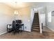 Office space with brown carpet and stairs to the 2nd floor at 12381 Liberty Beacon Ave, Las Vegas, NV 89138