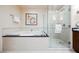 Modern bathroom with a bathtub and a separate glass-enclosed shower for convenience and luxury at 145 E Harmon Ave # 2007, Las Vegas, NV 89109