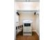 Bright closet with white chest, safe, and closet rack with hangers and iron for convenience at 145 E Harmon Ave # 2007, Las Vegas, NV 89109