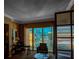 Suite living area with work desk and sitting area with an expansive city view at 145 E Harmon Ave # 2007, Las Vegas, NV 89109