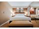 Bright main bedroom featuring a king bed, soft lighting, and cozy seating to enjoy at 145 E Harmon Ave # 2007, Las Vegas, NV 89109
