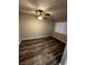 Bedroom with hardwood floors, neutral colors and a ceiling fan at 1639 Justin Cir # 1639, Henderson, NV 89011