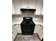 An oven top with white cabinets at 1639 Justin Cir # 1639, Henderson, NV 89011