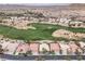 Bird's eye view of a beautiful community and a golf course surrounded by homes at 181 Cliff Valley Dr, Las Vegas, NV 89148