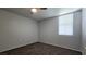Bedroom featuring a ceiling fan, neutral walls, carpeted floors, and bright window at 2325 Windmill Pkwy # 1313, Henderson, NV 89074