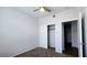 Bedroom featuring a ceiling fan, neutral walls, carpet, and closet at 2325 Windmill Pkwy # 1313, Henderson, NV 89074